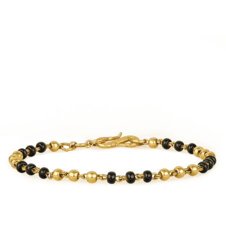 22ct Gold Baby Bracelet with Black Bead Accents 22ct Gold Baby Bracelet with Black Bead Accents