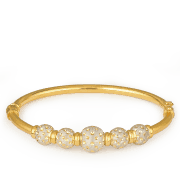 Texturierter Armreif aus 22 Karat Gold mit Rhodium-Akzenten