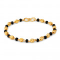 22 Karat Gold Babyarmband mit schwarzen Perlen