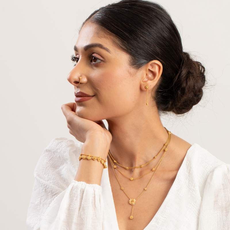 سلسال زهرة وردية من الذهب عيار 22 قيراط سلسال زهرة وردية من الذهب عيار 22 قيراط