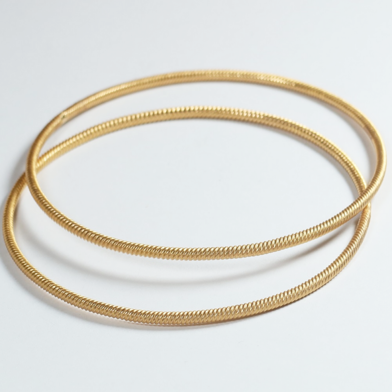 سوار ذهبي عيار 22 قيراط من الذهب عيار 22 قيراطاً ملتوي | ملابس يومية سوار ذهبي عيار 22 قيراط من الذهب عيار 22 قيراطاً ملتوي | ملابس يومية