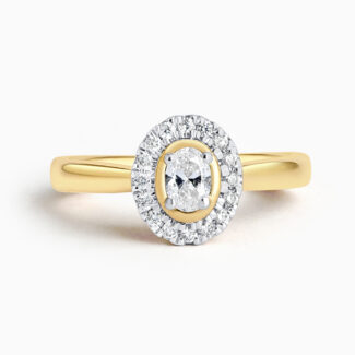Elegant Halo Engagement Ring in 18ct Gold Elegant Halo Engagement Ring in 18ct Gold