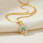 قلادة طاووس أوم طاووس من الذهب عيار 22 قيراط قلادة طاووس أوم طاووس من الذهب عيار 22 قيراط