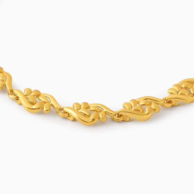 سوار من الذهب عيار 22 قيراط ذهبي ملتف بحلقة زهرية سوار من الذهب عيار 22 قيراط ذهبي ملتف بحلقة زهرية