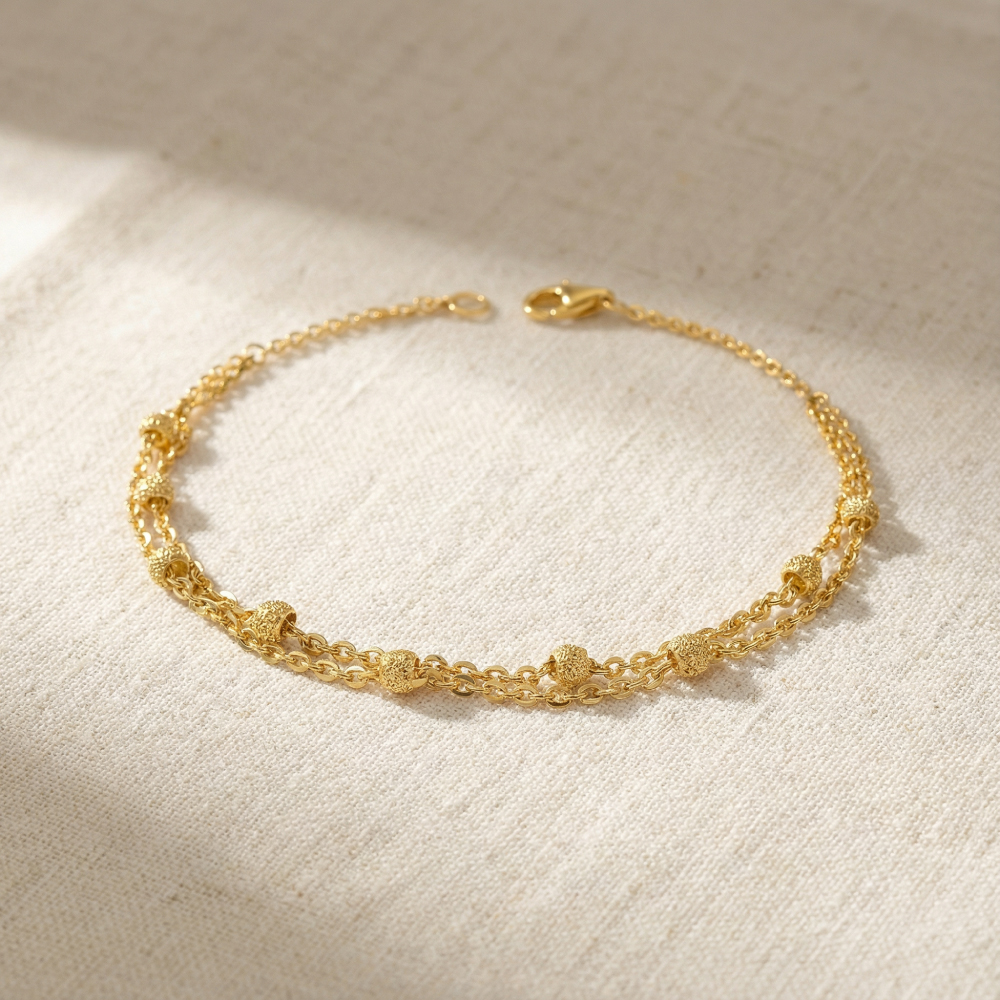 سوار من الذهب عيار 22 قيراط ذهبي ثنائي السلسلة مطرز بالخرز سوار من الذهب عيار 22 قيراط ذهبي ثنائي السلسلة مطرز بالخرز