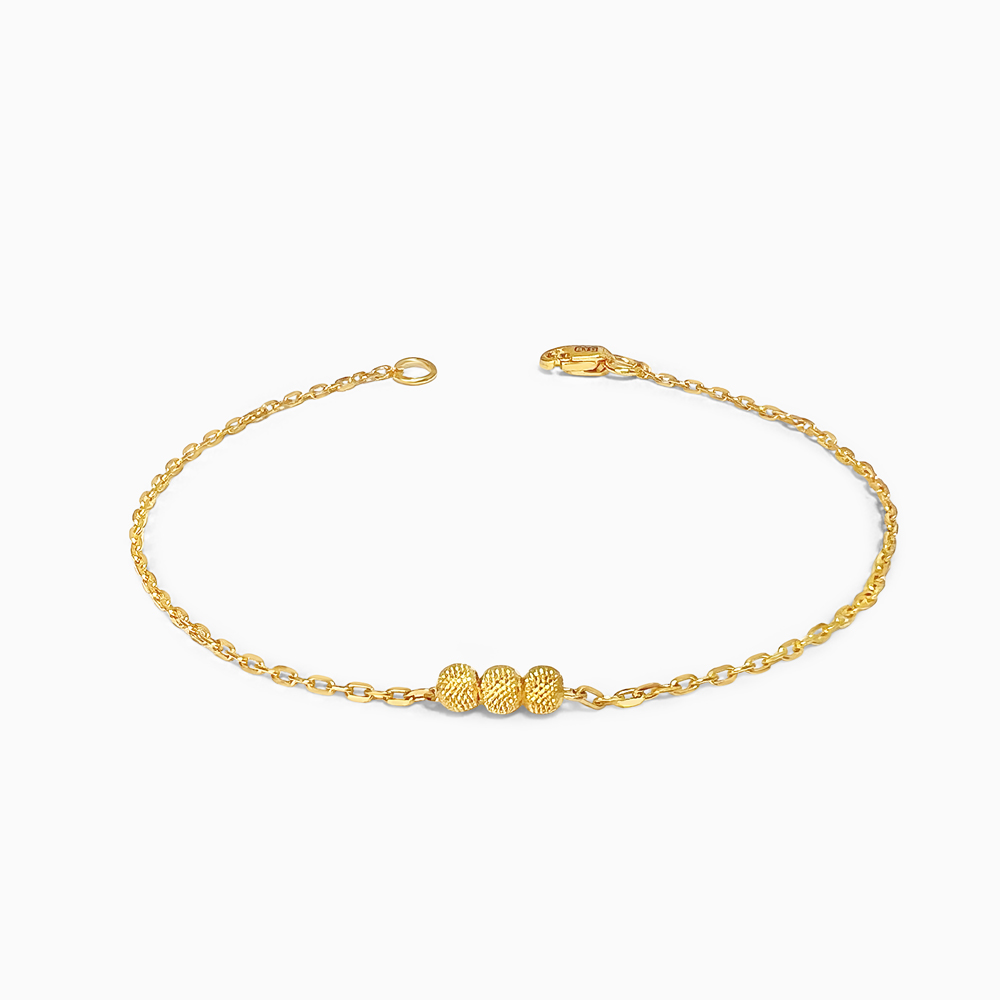 سوار من الذهب الرقيق عيار 22 قيراط مع ثلاث خرزات ذهبية سوار من الذهب الرقيق عيار 22 قيراط مع ثلاث خرزات ذهبية